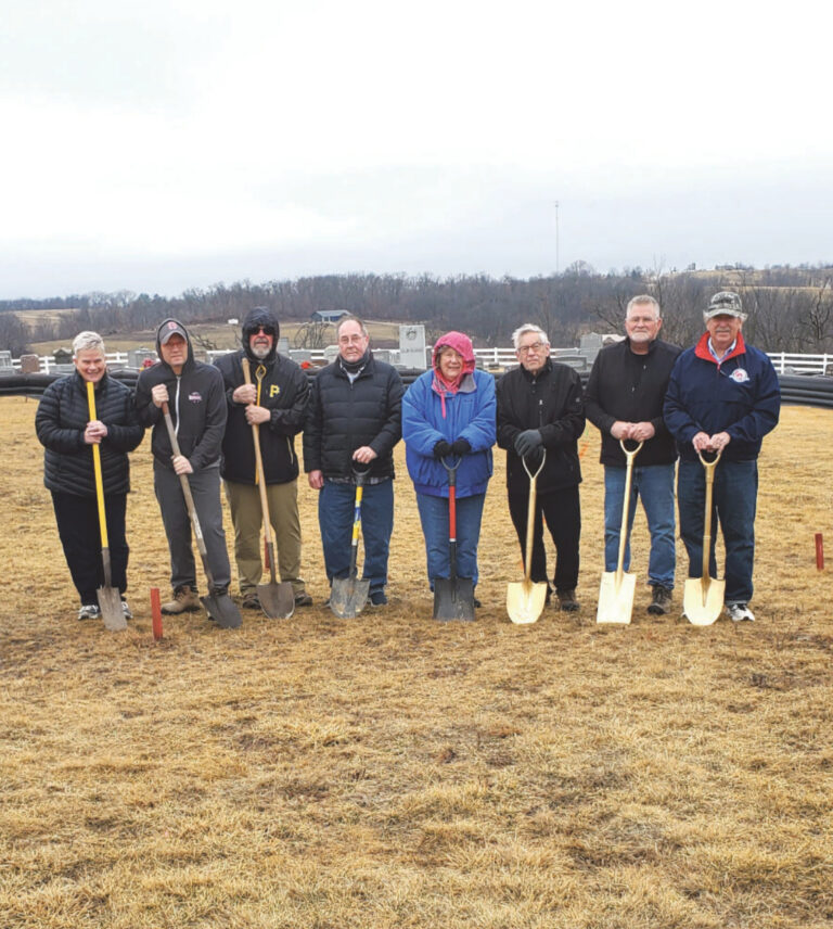 From left to right: Peggy Soehnlein, church president Mike Flanagan, Tim Rucker, Jay Newman, Beth Fransen, architect Bob Davis, Jeff Wilhelmson, and Stan Bigelow.