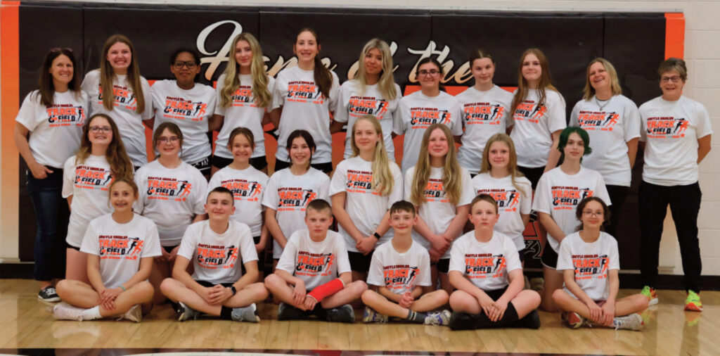 Row 1: Jadea Pacheco, Cooper Lelle, Jase Johnson, Jackson Russell, Warren Easterday, Aurelia Kelley Row 2: Delilah Holcomb, Brytta Falsey, Zuri Koch, Layla Dahl, Kitra Neff, Tilly Weber, Kaitlin Baumann, Attica Leopold Row 3: Coach Mandy Koch, Ava Bevins, Sophia Zepeda, Haleigh Fish, Jade Wellnitz, Ady Newman, Elaina Pederson, Taylor Wonders, Addy Kuebli, Assistant Coach Kendra Johnson, and Assistant Coach Gwen Fischer. Missing from the photo is Ella Rice & Waylon Orton