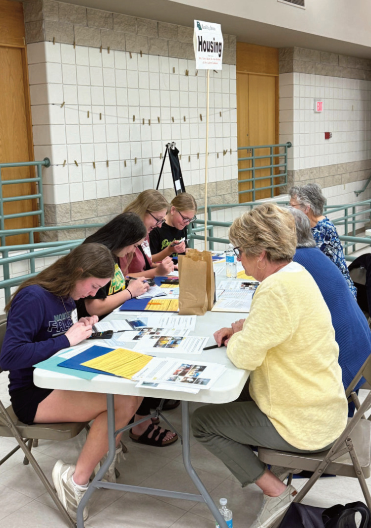 Group of people practicing financial literacy
