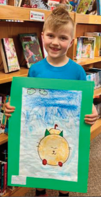Axton, a student in the Kindergarten class, created a mixed-media work titled Imaginary Cat. He shared that he began with the lines and made the face, then used chalk and marker to finish it. Axton said he likes how the picture turned out, and especially enjoyed adding lots of details to make the picture more interesting.