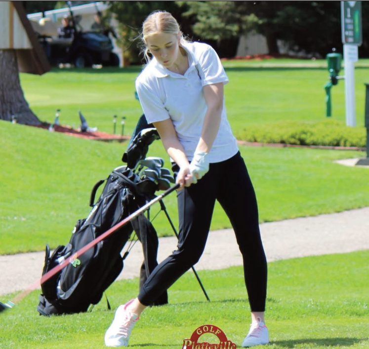 AP's Avari Steiner about to unleash on this drive Saturday at Plat- teville. She finished in a tie for fourth shooting a 79.