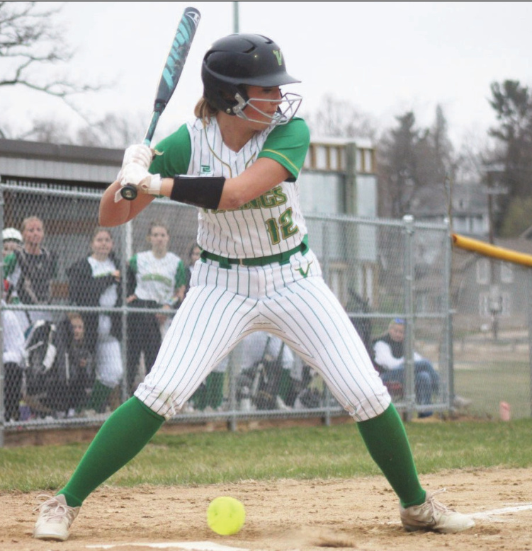 Tatum Kurschner watches a low pitch go by for a ball.