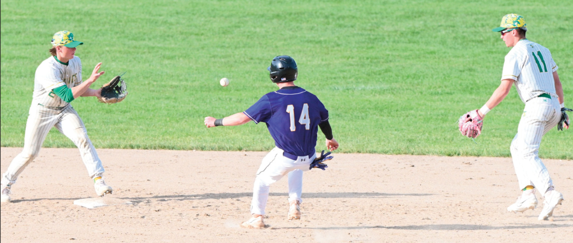 Shortstop Ashton McNett receives a toss from 2nd basemen Martin Anderson for a double play attempt. Photo by Anita Schmid.