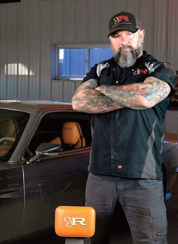 man standing by car
