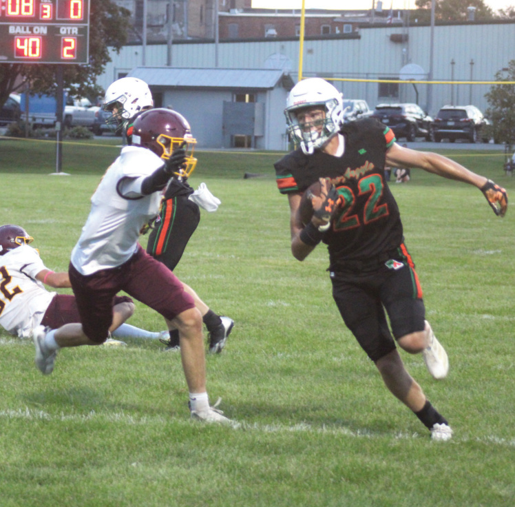 Pec/Argyle's Luke Leonard runs past the Waterloo defense. Photo by Kayla Barnes.